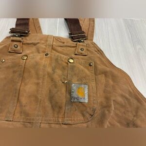 distressed Carhartt bib overalls